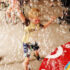 small child playing in bubbles at Children's Clinics Play Group